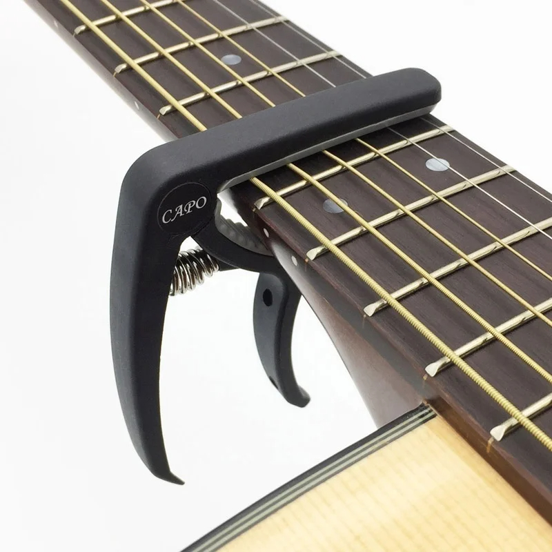 Plastic Guitar Capo for 6 Stri - Musical Instrument Gif のレビューと価格
