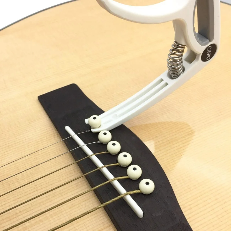 Plastic Guitar Capo for 6 Stri - Musical Instrument Gif のレビューと価格